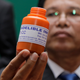 An officer of the Cambodian National Election Committee (NEC) holds an indelible ink bottle during an election ink testing event in Phnom Penh, Cambodia, 17 July 2018. Cambodia will hold its sixth national elections on 29 July 2018.